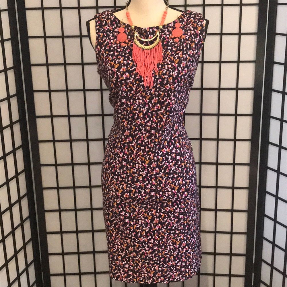 A multicolored sleeveless mid length dress